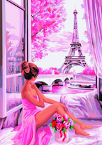 Девушка в вечернем платье любуется Эйфелевой башней